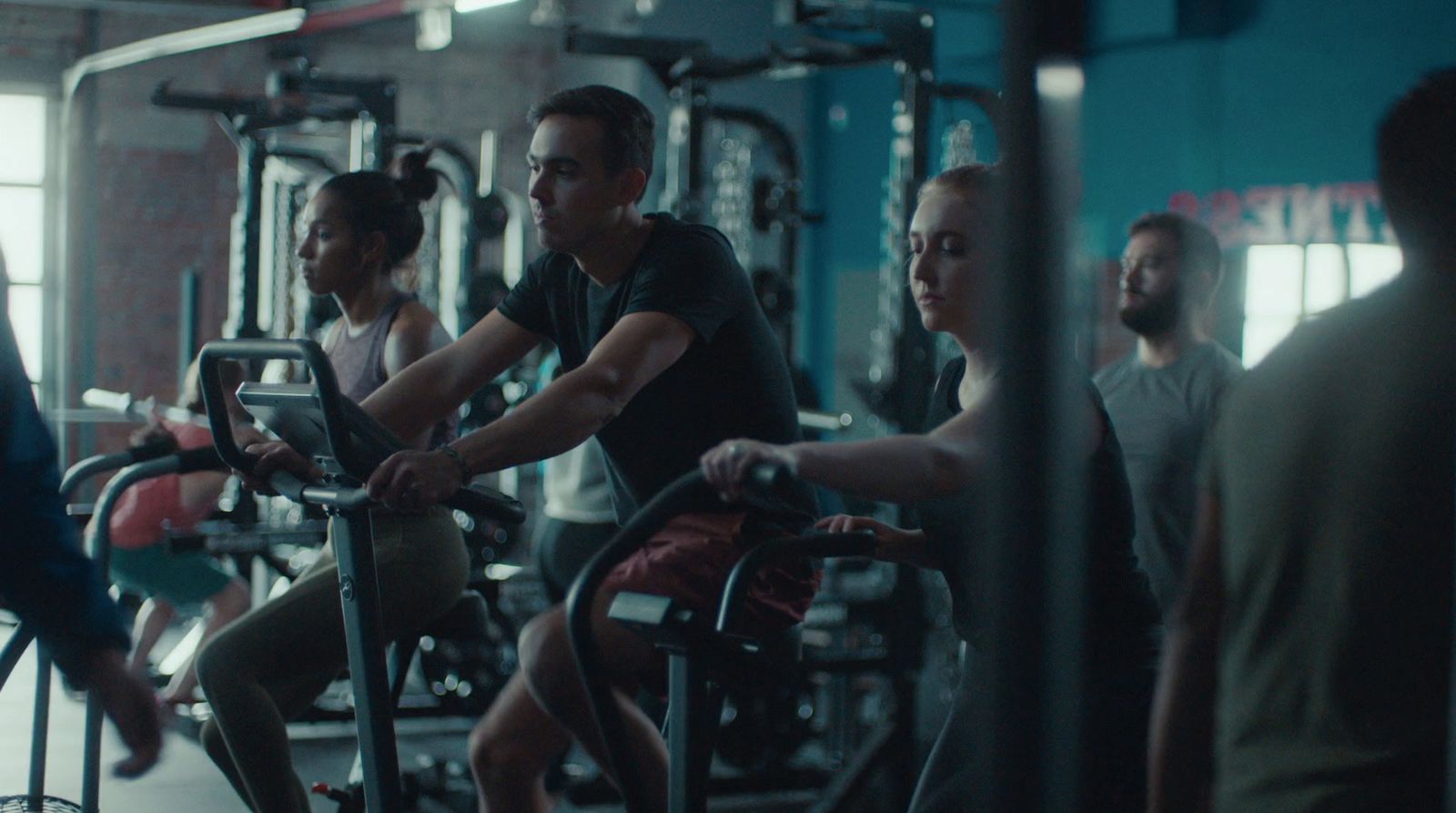 a group of people working out in a gym