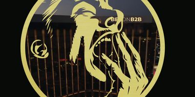 a close up of a logo on a fence
