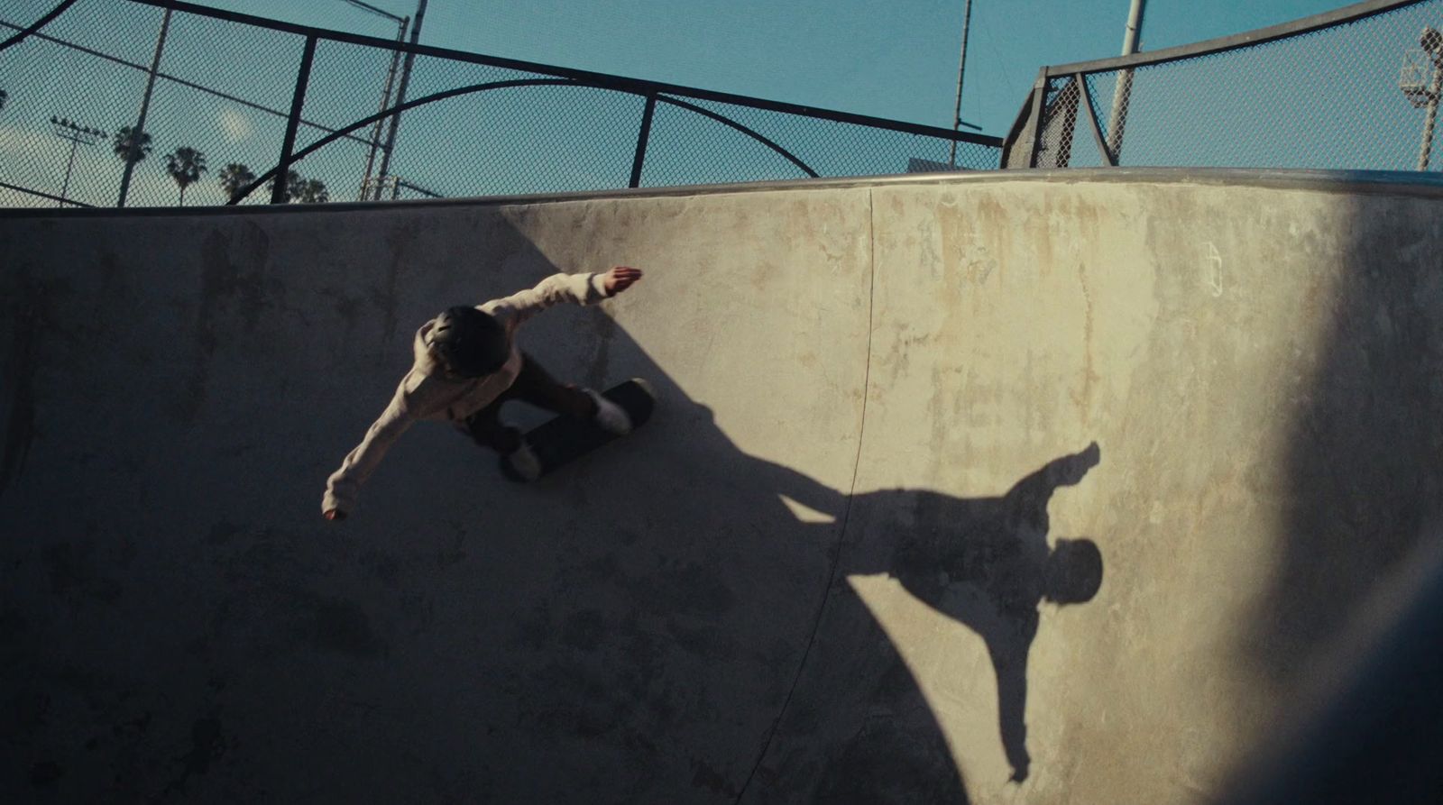 a man riding a skateboard up the side of a ramp