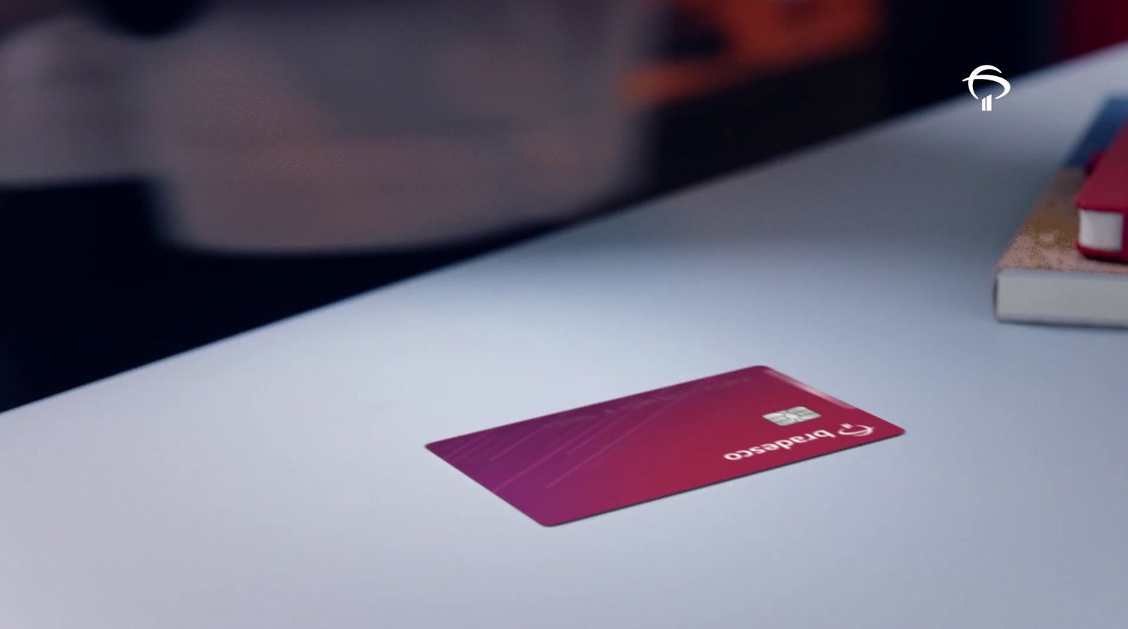 a red card sitting on top of a white table