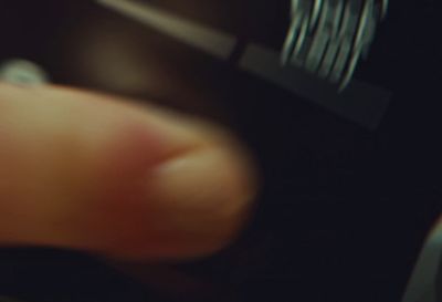 a close up of a person holding a cell phone