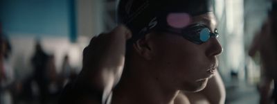 a man in a swimming cap and goggles