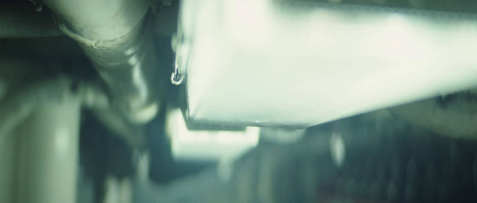 a close up of a metal object with a blurry background