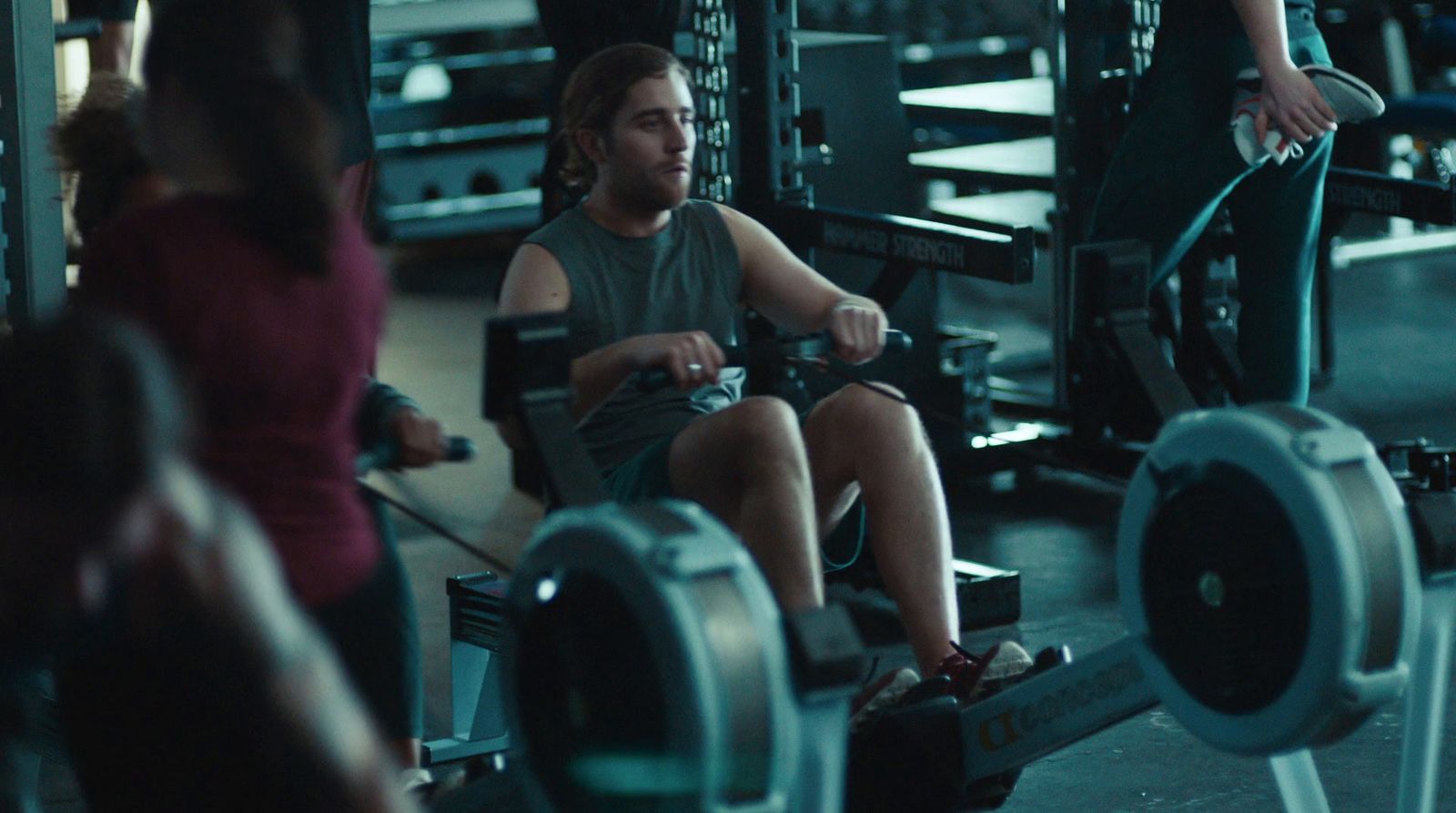 a group of people working out in a gym