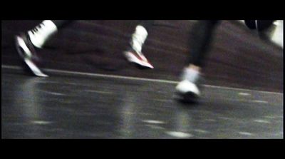 a blurry photo of a person riding a skateboard