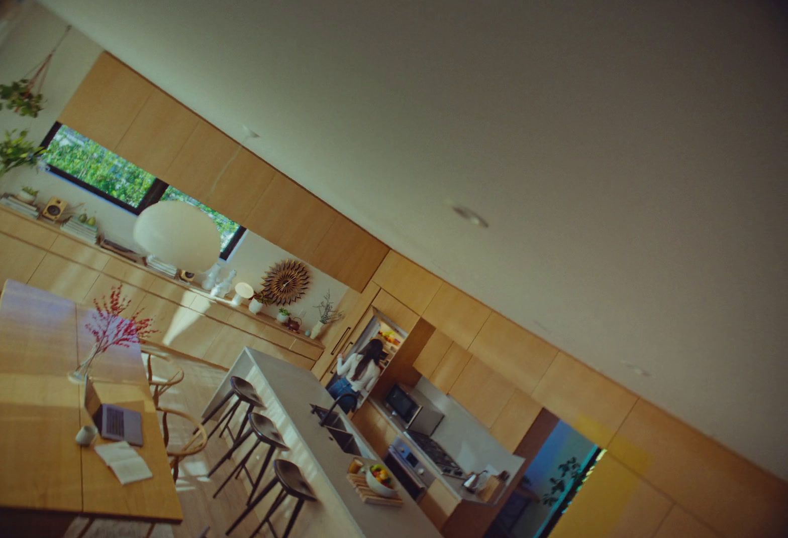 a view of a kitchen and dining room from above