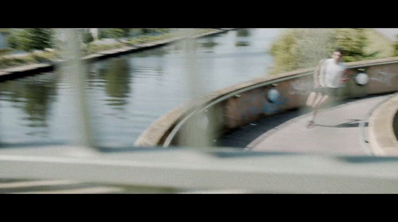 a man riding a skateboard down the side of a ramp