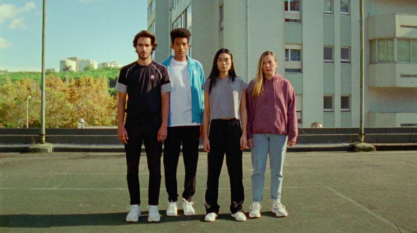 a group of young people standing next to each other