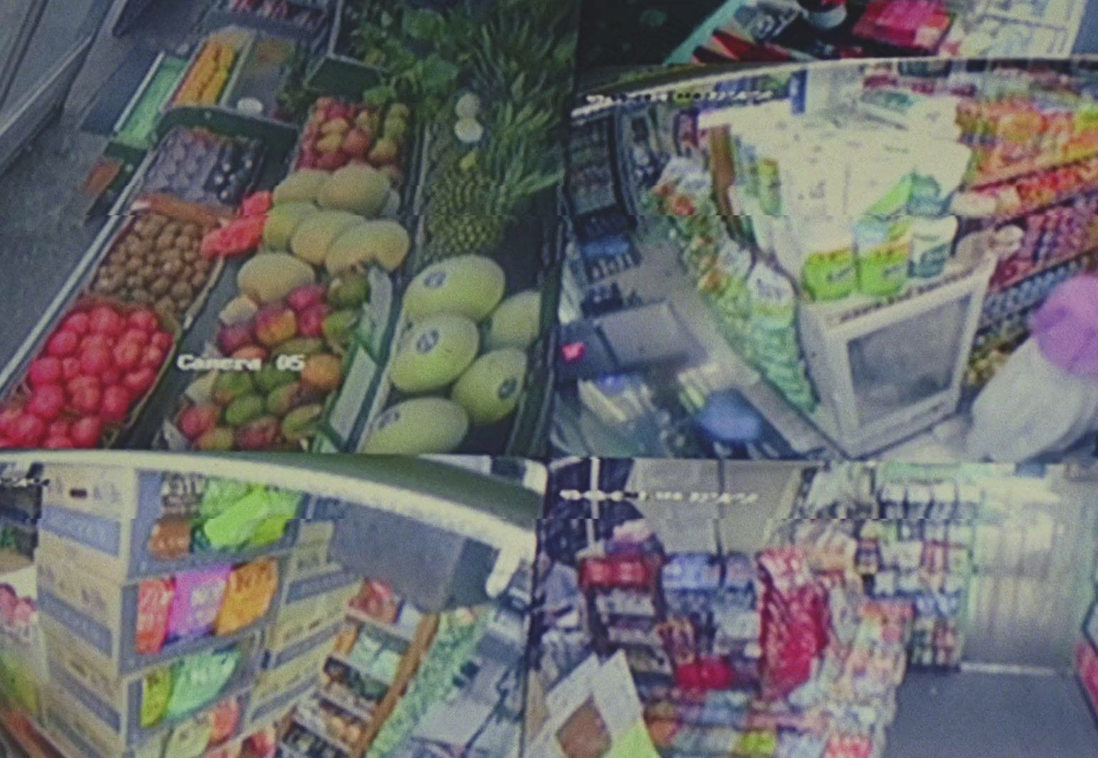 a display of fruit and vegetables in a grocery store