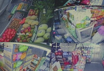 a display of fruit and vegetables in a grocery store