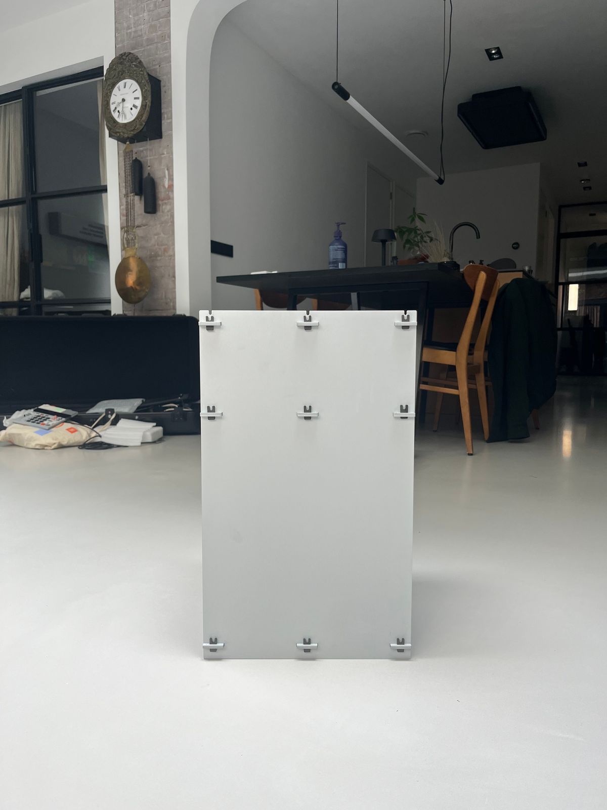 a white box sitting in the middle of a room