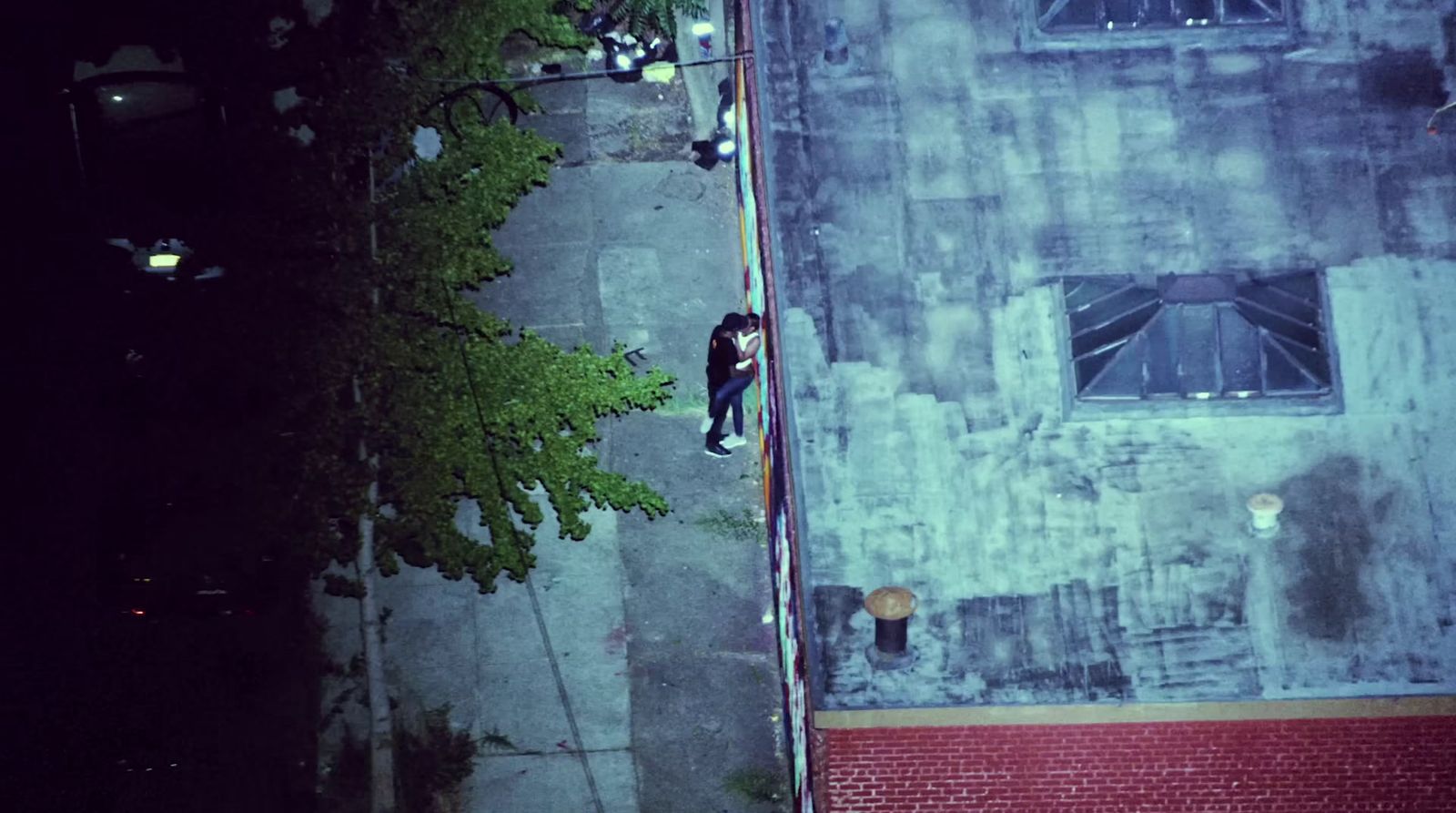 an overhead view of a building and a street