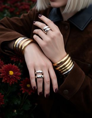 a woman with two rings on her hand