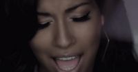 a close up of a person with her mouth open