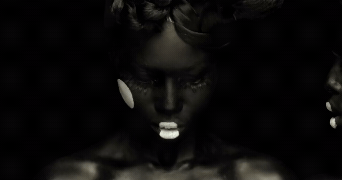 a black and white photo of a woman's face
