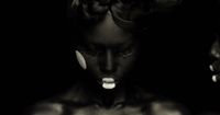 a black and white photo of a woman's face