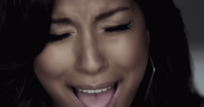 a close up of a person with her mouth open