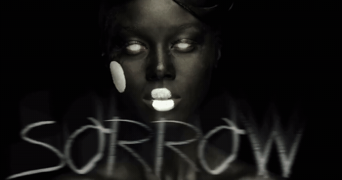 a black and white photo of a woman with her eyes open