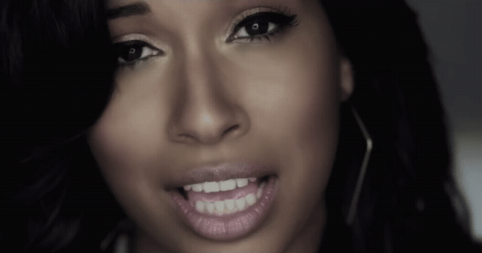 a close up of a person with a smile on her face