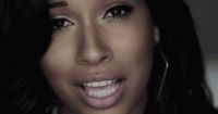 a close up of a person with a smile on her face
