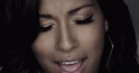 a close up of a person with her mouth open
