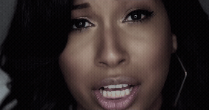 a close up of a person with a smile on her face