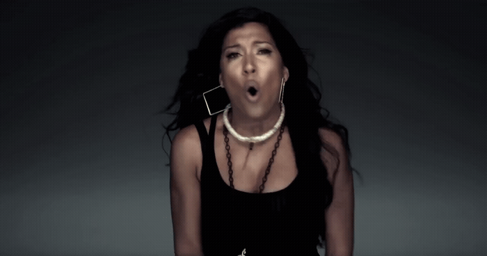 a woman making a surprised face with her mouth open