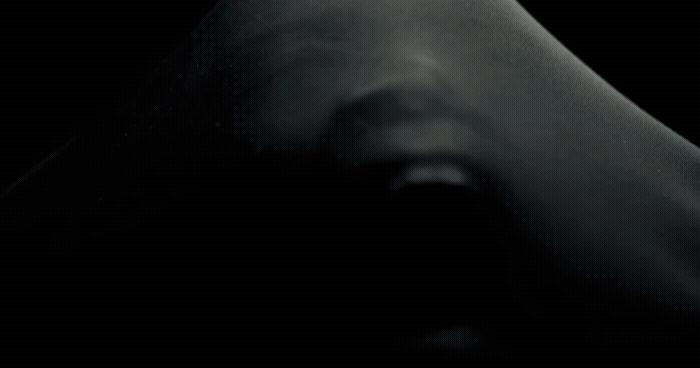 a black and white photo of a person's hand