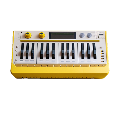 a yellow and white electronic keyboard on a black background