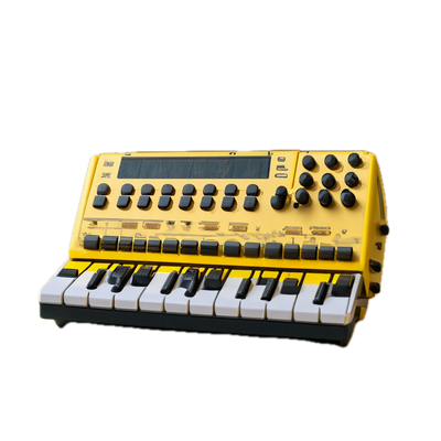 a yellow and black electronic keyboard on a black background