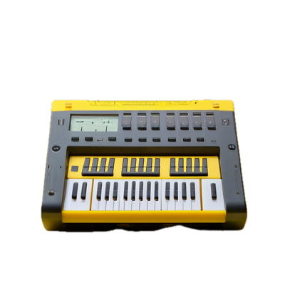 a yellow and black electronic keyboard on a black background