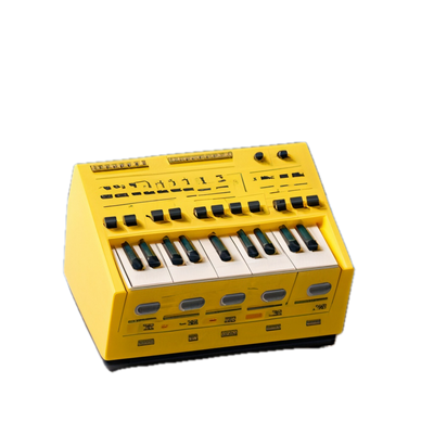 a yellow electronic keyboard sitting on top of a black background