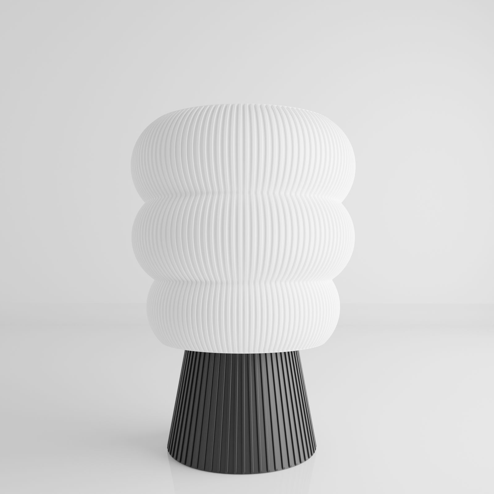a white vase sitting on top of a table
