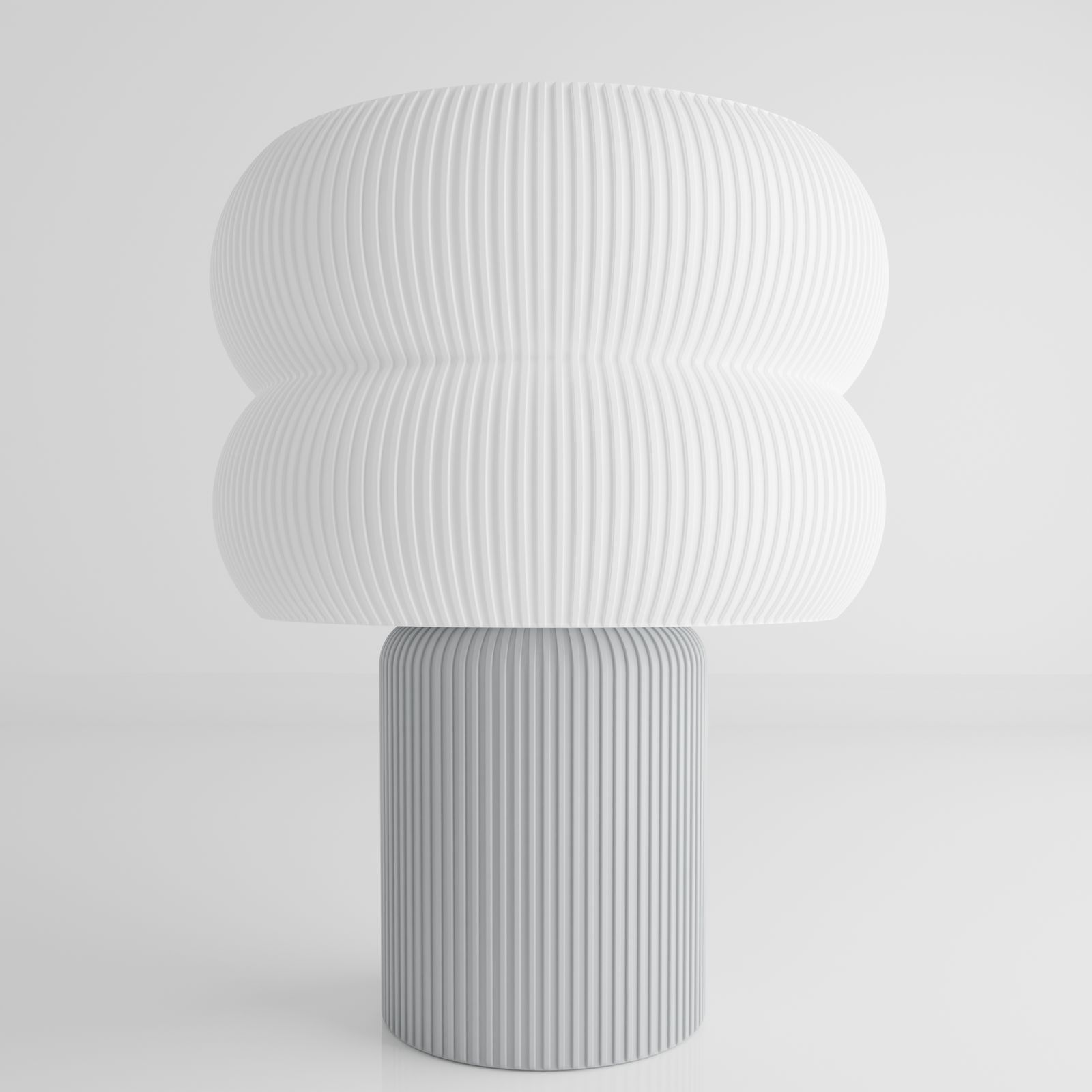 a large white vase sitting on top of a table