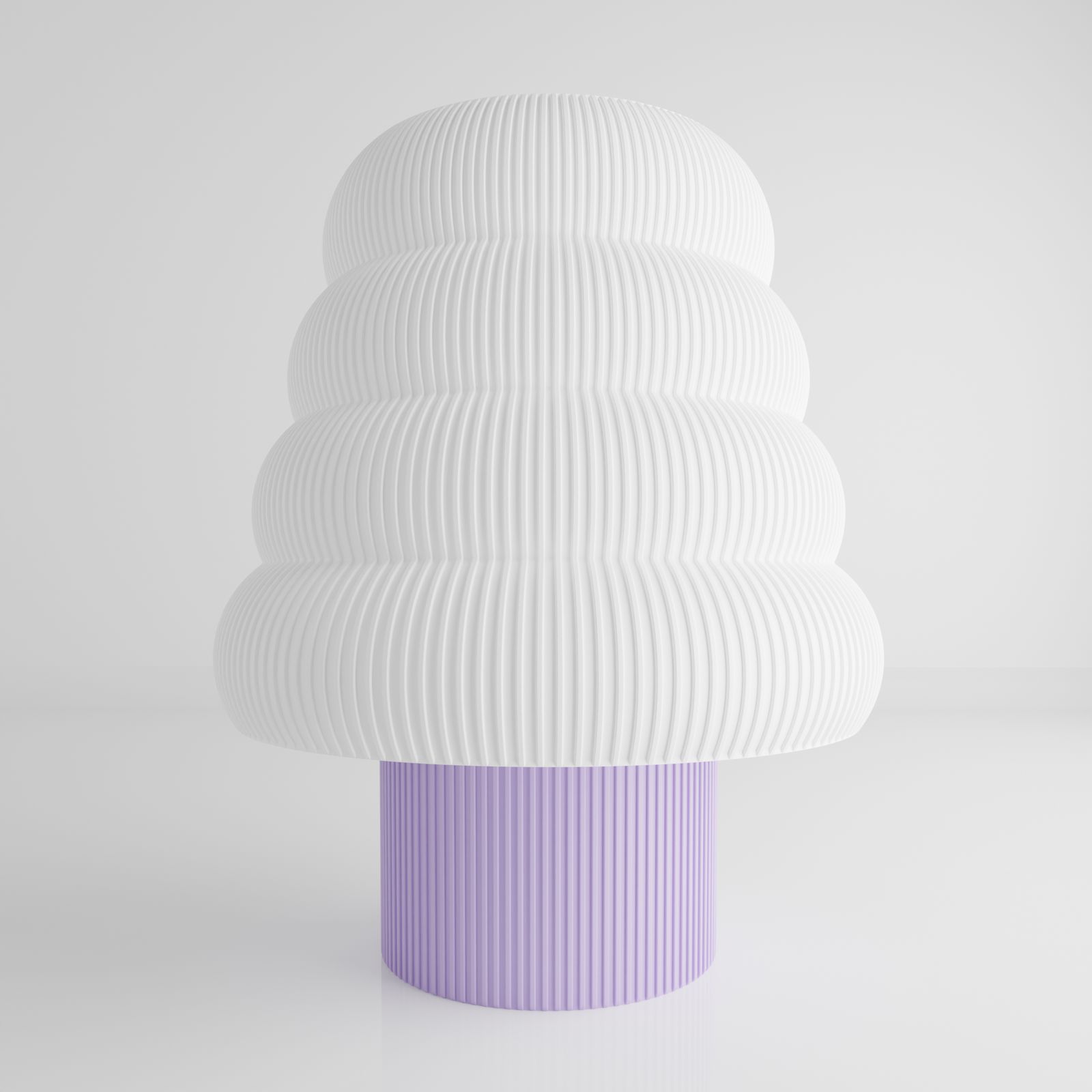 a white and purple vase sitting on top of a table
