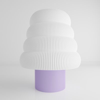 a white and purple vase sitting on top of a table