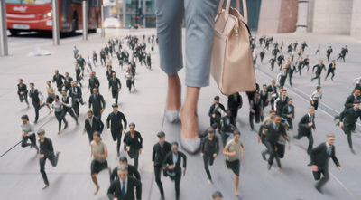 a large group of people walking down a street