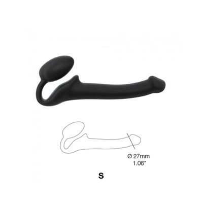 a black object with a long handle on a white background
