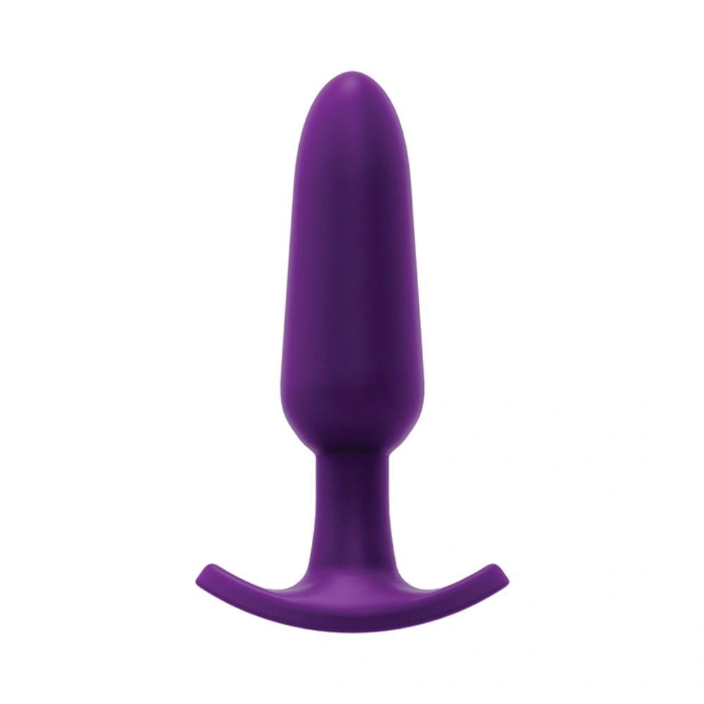 a purple plastic dilll on a white background