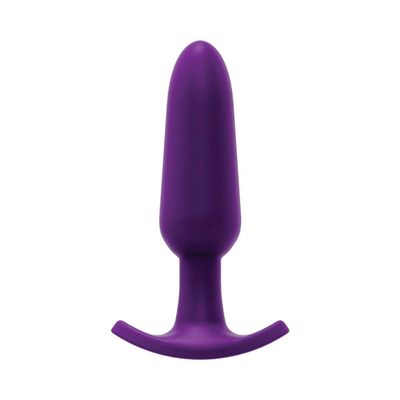 a purple plastic dilll on a white background