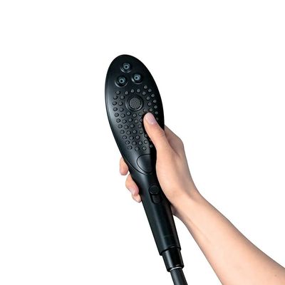 a hand holding a black hair dryer on a white background