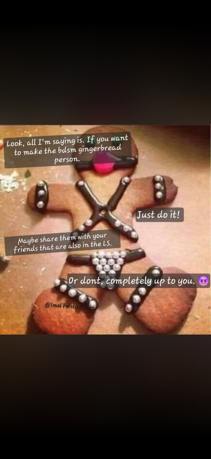 a picture of a gingerbread man with a cross on it