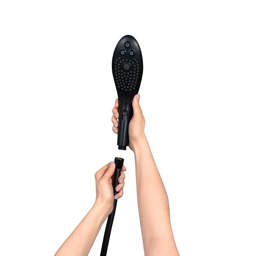a person holding a hair dryer in their hand