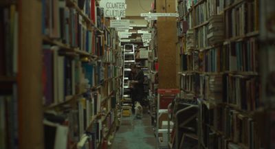 a long row of bookshelves filled with lots of books