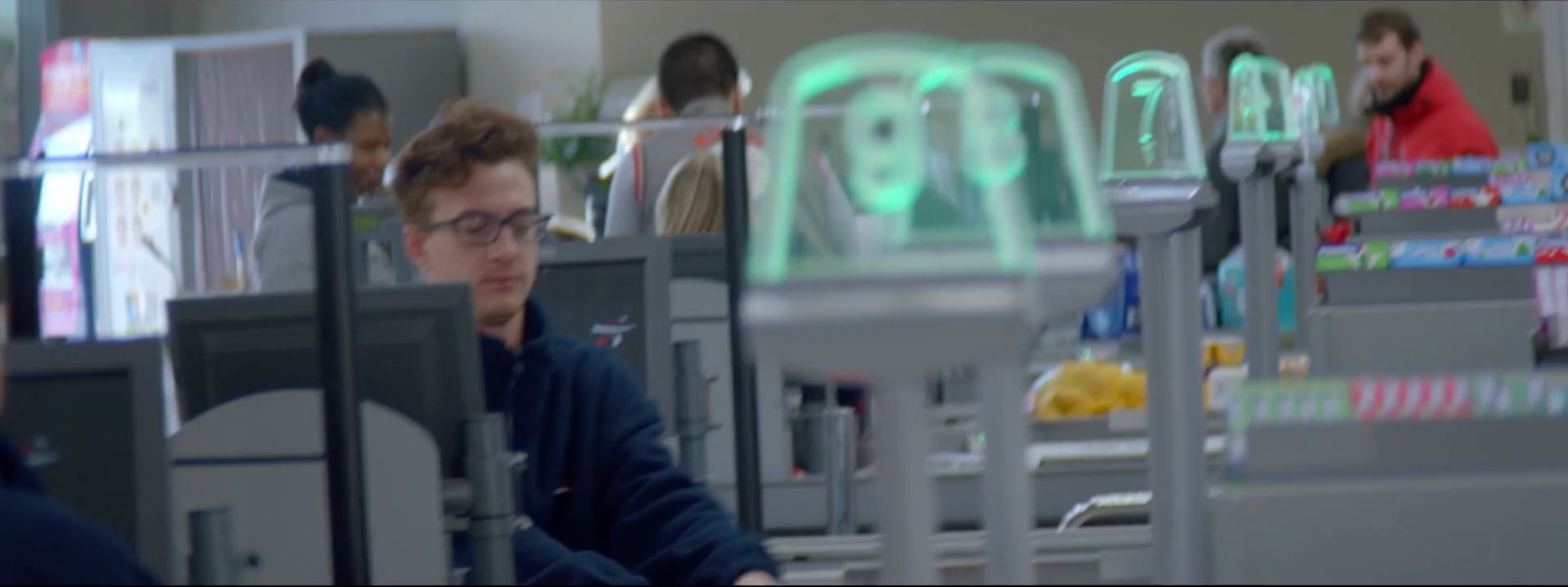 a man sitting at a desk in an office