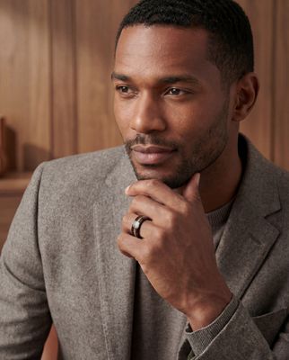 a man with a ring on his finger