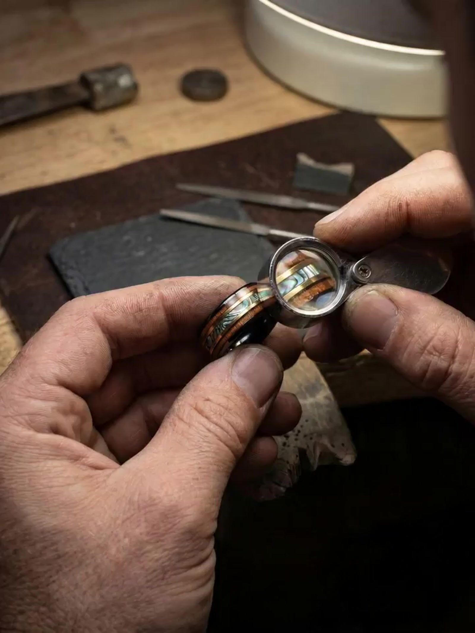 a man holding a pair of scissors in his hands