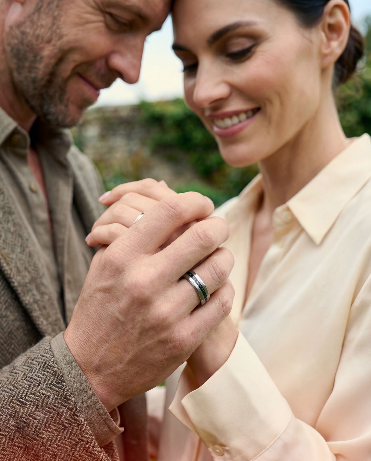 a man and a woman are holding hands
