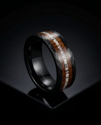 a wedding ring with a wooden inlay