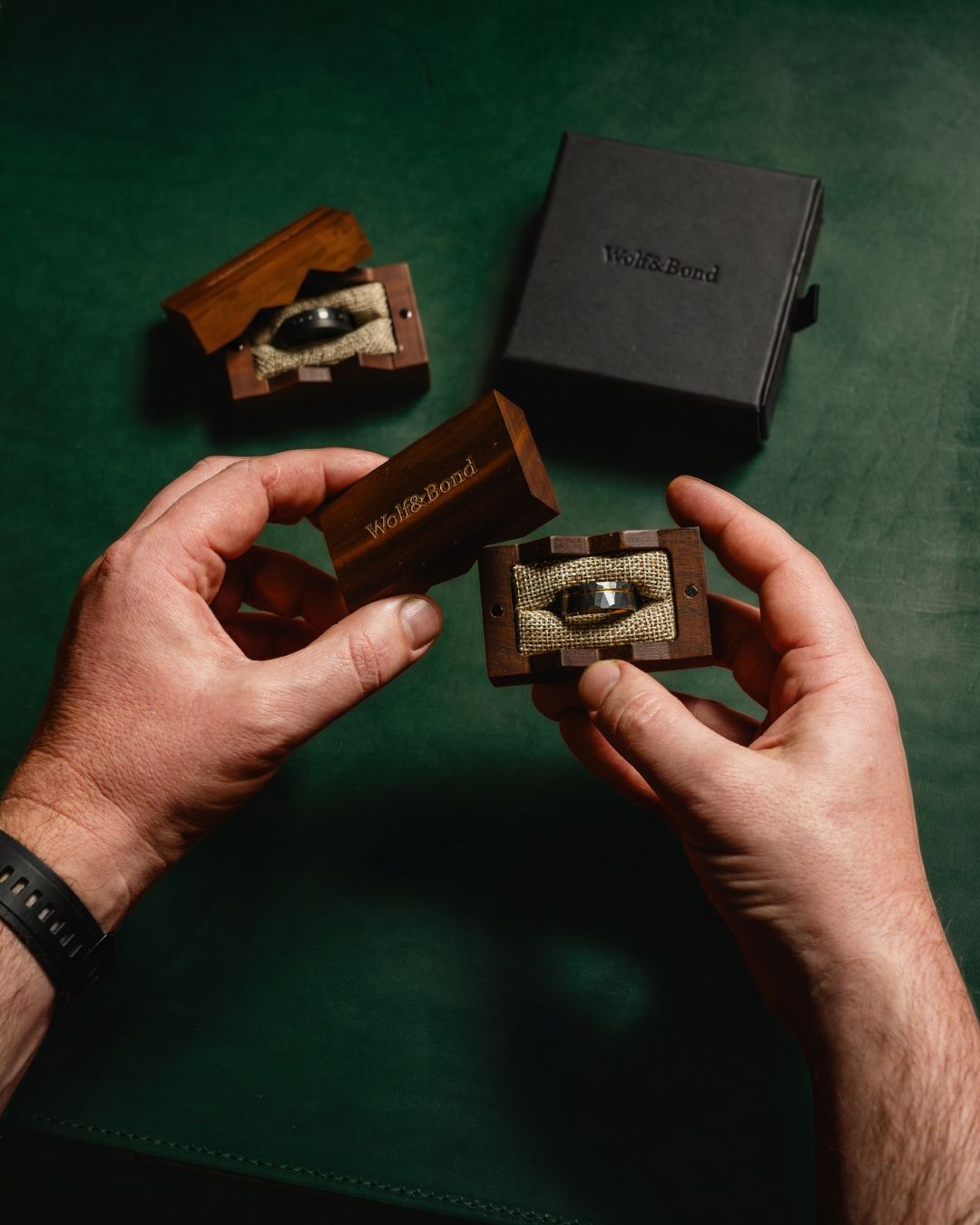 a person holding a wooden object in their hands